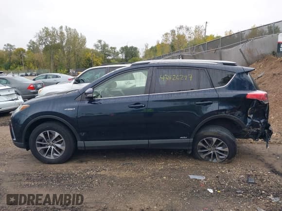 ✅ 2018 Toyota RAV4 Hybrid XLE • VIN: JTMRJREV0JD241600 • Lot: 43426297. Listed on IAAI with 63,794 mi. Free auction sales archive from the USA and detailed vehicle history report at DreamBid. Image 14.
