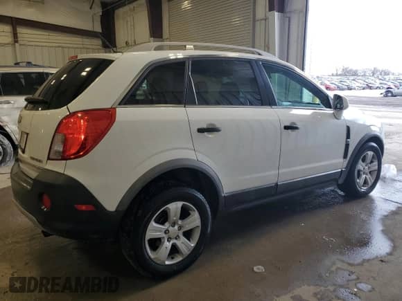 2013 Chevrolet Captiva Sport LS с VIN 3GNAL2EK9DS629019, выставлен на аукционе Copart как лот 79765884 с пробегом 97 750 миль миль и Чистый • Clean title. История ставок и продаж доступна на DreamBid. Изображение 3.
