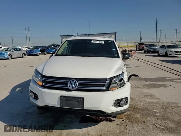 ✅ 2017 Volkswagen Tiguan Sport • VIN: WVGTV7AX7HK011317 • Лот: 80454325. Опубликован ранее на Copart с пробегом 88 351 миль. Бесплатный доступ к архиву аукционных продаж из США и подробный отчёт об истории автомобиля на DreamBid. Изображение 14.