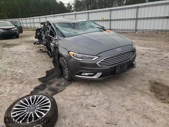 ✅ 2018 Ford Fusion Titanium • VIN: 3FA6P0SU9JR191995 • Лот: 51430505. Опубликован ранее на Copart с пробегом Не указан. Бесплатный доступ к архиву аукционных продаж из США и подробный отчёт об истории автомобиля на DreamBid. Изображение 11.