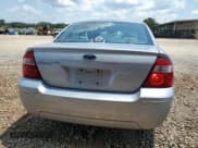 ✅ 2005 Ford Five Hundred SE • VIN: 1FAFP23125G117489 • Lot: 66215175. Wystawiony na Copart z przebiegiem 271 185 mil. Bezpłatny archiwum sprzedaży aukcyjnych z USA i szczegółowy raport historii pojazdu na DreamBid. Zdjęcie 6.