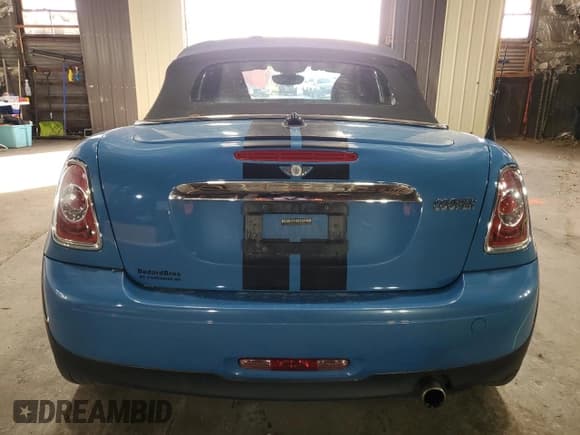 ✅ 2014 MINI Roadster • VIN: WMWSY1C53ET719549 • Lot: 80166874. Listed on Copart with 84,696 mi. Free auction sales archive from the USA and detailed vehicle history report at DreamBid. Image 6.