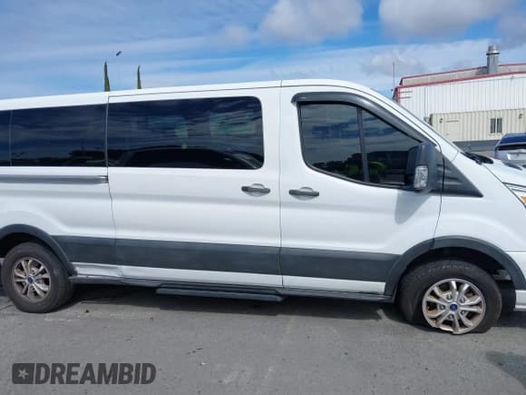 ✅ 2021 Ford Transit Passenger XL • VIN: 1FBAX2Y88MKA15155 • Lot: 41730982. Listed on IAAI with 70,357 mi. Free auction sales archive from the USA and detailed vehicle history report at DreamBid. Image 13.