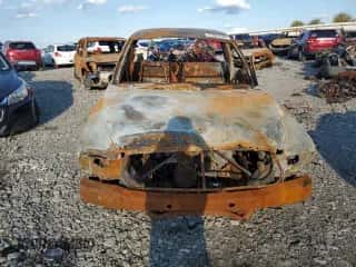 2003 Dodge Dakota z VIN 1D7GG16X23S267062, wystawiony jako Copart lot #71924784 z przebiegiem Nie podano mil oraz Szkoda całkowita • Salvage title. Historia ofert i sprzedaży dostępna na DreamBid. Obrazek 5.