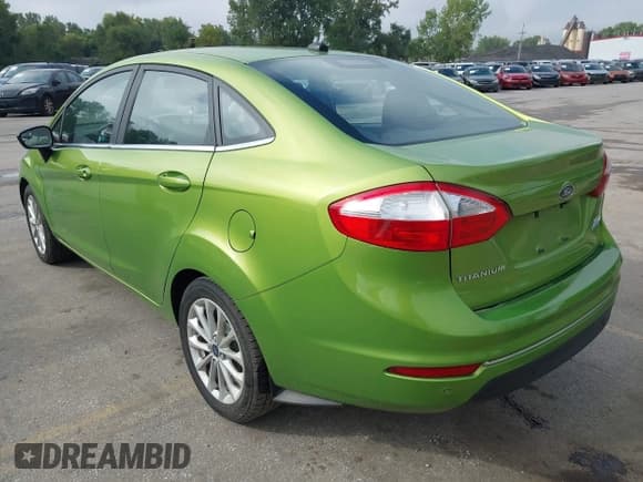 ✅ 2018 Ford Fiesta Titanium • VIN: 3FADP4CJ9JM117668 • Lot: 43281962. Listed on IAAI with 104,716 mi. Free auction sales archive from the USA and detailed vehicle history report at DreamBid. Image 3.