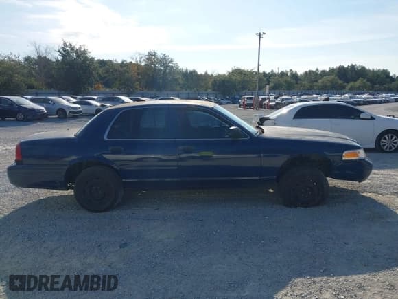 ✅ 2002 Ford Police Interceptor • VIN: 2FAFP71W72X157701 • Lot: 43719670. Listed on IAAI with 155,894 mi. Free auction sales archive from the USA and detailed vehicle history report at DreamBid. Image 13.