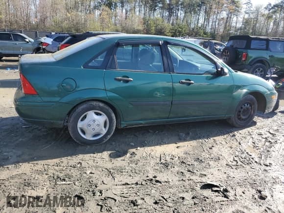 ✅ 2001 Ford Focus LX • VIN: 1FAFP33P91W363918 • Lot: 52200585. Listed on Copart with 162,988 mi. Free auction sales archive from the USA and detailed vehicle history report at DreamBid. Image 3.