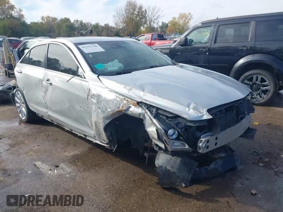 ✅ 2014 Cadillac ATS Luxury AWD • VIN: 1G6AH5SX1E0105774 • Лот: 43593748. Опубликован ранее на IAAI с пробегом 59 326 миль. Бесплатный доступ к архиву аукционных продаж из США и подробный отчёт об истории автомобиля на DreamBid. Изображение 1.