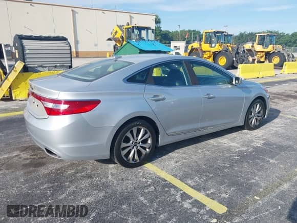 2014 Hyundai Azera с VIN KMHFG4JG9EA341354, выставлен на аукционе IAAI как лот 42711386 с пробегом 144 157 миль миль и . История ставок и продаж доступна на DreamBid. Изображение 4.