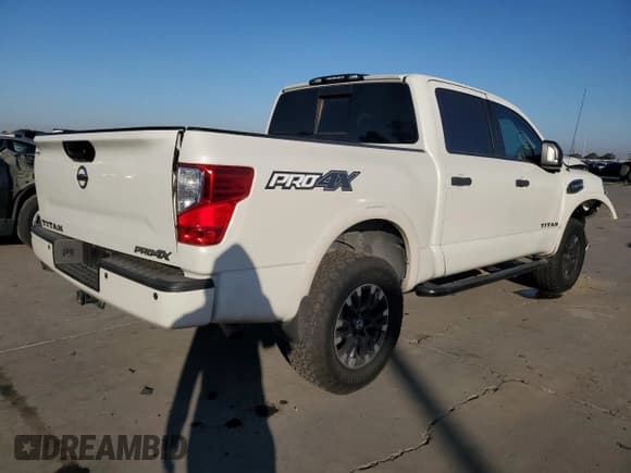 ✅ 2017 Nissan Titan Pro-4X • VIN: 1N6AA1E58HN548609 • Lot: 90290125. Listed on Copart with 72,769 mi. Free auction sales archive from the USA and detailed vehicle history report at DreamBid. Image 3.