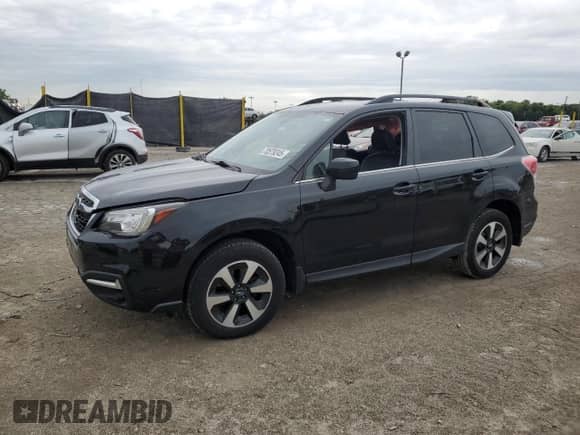 2017 Subaru Forester Limited with VIN JF2SJARC0HH486770, listed as a Copart auction lot 70579245 with 61,739 mi miles and Salvage title. Bid and sale history available at DreamBid. Image 1.