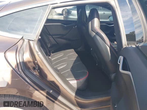 ✅ 2013 Tesla Model S Performance • VIN: 5YJSA1DP4DFP26079 • Lot: 42628352. Listed on IAAI with 109,490 mi. Free auction sales archive from the USA and detailed vehicle history report at DreamBid. Image 8.