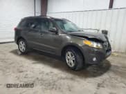 ✅ 2011 Hyundai Santa Fe SE • VIN: 5XYZHDAG8BG061824 • Lot: 77025964. Listed on Copart with 149,741 mi. Free auction sales archive from the USA and detailed vehicle history report at DreamBid. Image 4.