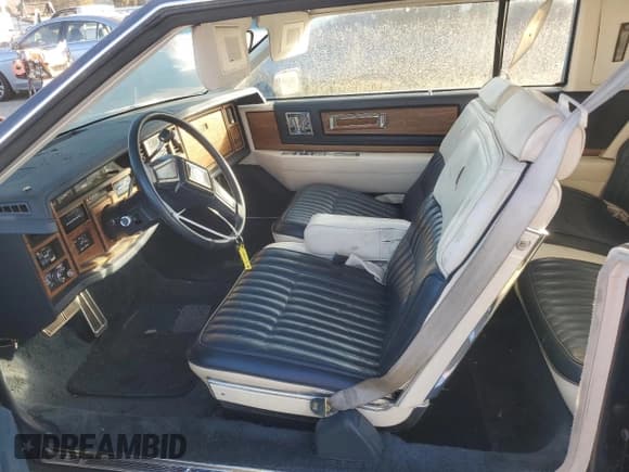 ✅ 1985 Cadillac Eldorado • VIN: 1G6EL5781FE655949 • Lot: 41961275. Listed on Copart with 4,479 mi. Free auction sales archive from the USA and detailed vehicle history report at DreamBid. Image 7.
