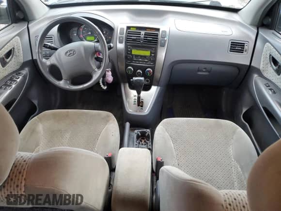 2005 Hyundai Tucson GLS z VIN KM8JN72D85U131798, wystawiony jako Copart lot #79274634 z przebiegiem 122 271 mil mil oraz Szkoda całkowita • Salvage title. Historia ofert i sprzedaży dostępna na DreamBid. Obrazek 8.