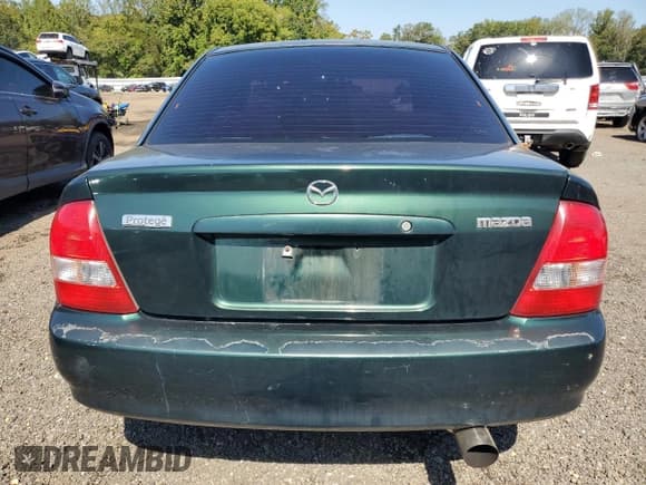 ✅ 2000 Mazda Protege ES • VIN: JM1BJ2239Y0268002 • Lot: 81656605. Listed on Copart with 233,894 mi. Free auction sales archive from the USA and detailed vehicle history report at DreamBid. Image 6.