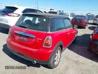 ✅ 2009 MINI Hardtop • VIN: WMWMF33509TW77258 • Lot: 42923353. Listed on IAAI with 94,201 mi. Free auction sales archive from the USA and detailed vehicle history report at DreamBid. Image 4.