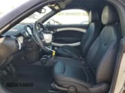 ✅ 2014 MINI Roadster • VIN: WMWSY1C56ET719559 • Lot: 70932605. Wystawiony na Copart z przebiegiem 57 897 mil. Bezpłatny archiwum sprzedaży aukcyjnych z USA i szczegółowy raport historii pojazdu na DreamBid. Zdjęcie 7.