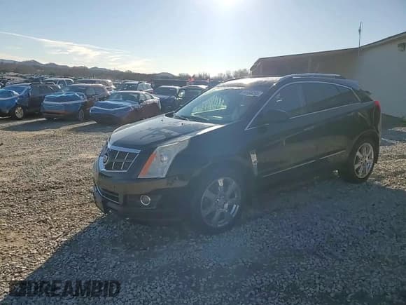 ✅ 2012 Cadillac SRX Performance Collection • VIN: 3GYFNEE39CS659777 • Lot: 94455295. Listed on Copart with 181,120 mi. Free auction sales archive from the USA and detailed vehicle history report at DreamBid. Image 14.