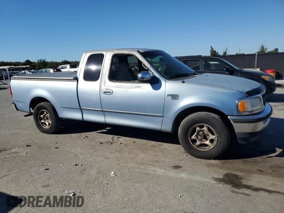 ✅ 1998 Ford F-150 • VIN: 1FTZX1760WNB34800 • Lot: 91009275. Listed on Copart with 279,393 mi. Free auction sales archive from the USA and detailed vehicle history report at DreamBid. Image 4.