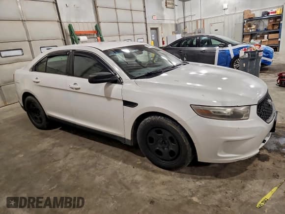 ✅ 2013 Ford Police Interceptor • VIN: 1FAHP2M82DG130472 • Lot: 96915135. Listed on Copart with 187,519 mi. Free auction sales archive from the USA and detailed vehicle history report at DreamBid. Image 4.