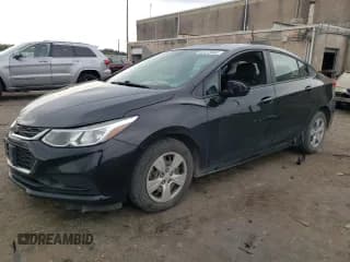 ✅ 2018 Chevrolet Cruze LS • VIN: 1G1BC5SM2J7210520 • Lot: 62313563. Listed on Copart with 118,481 mi. Free auction sales archive from the USA and detailed vehicle history report at DreamBid. Image 1.