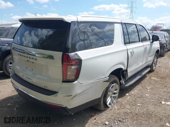 ✅ 2022 Chevrolet Suburban LT • VIN: 1GNSKCKD3NR165507 • Lot: 43139036. Listed on IAAI with 107,653 mi. Free auction sales archive from the USA and detailed vehicle history report at DreamBid. Image 4.
