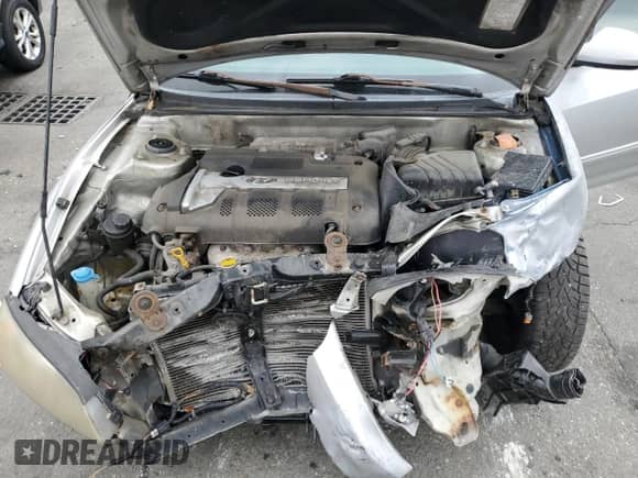 2004 Hyundai Elantra GLS z VIN KMHDN46D34U885437, wystawiony jako Copart lot #78289994 z przebiegiem 140 182 mil mil oraz Szkoda całkowita • Salvage title. Historia ofert i sprzedaży dostępna na DreamBid. Obrazek 11.