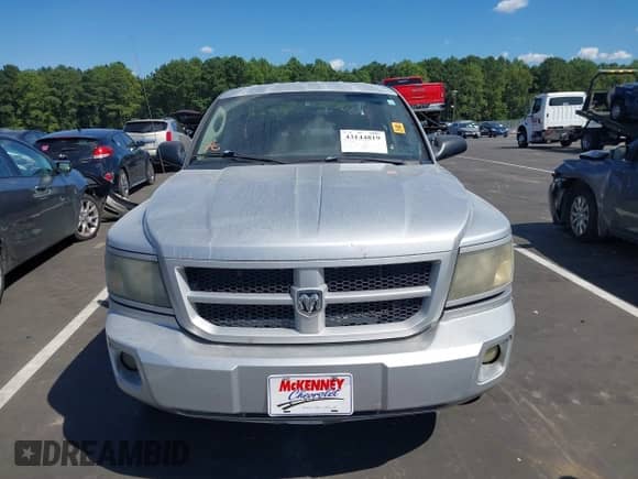 2009 Dodge Dakota SXT with VIN 1D7HE38K79S808641, listed as a IAAI auction lot 43144819 with 169,325 mi miles and . Bid and sale history available at DreamBid. Image 12.