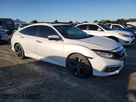 ✅ 2019 Honda Civic Touring • VIN: 19XFC1F94KE200077 • Lot: 84920195. Listed on Copart with 71,514 mi. Free auction sales archive from the USA and detailed vehicle history report at DreamBid. Image 4.