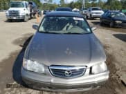 ✅ 2001 Mazda 626 LX • VIN: 1YVGF22CX15216386 • Lot: 90853915. Wystawiony na Copart z przebiegiem 48 162 mil. Bezpłatny archiwum sprzedaży aukcyjnych z USA i szczegółowy raport historii pojazdu na DreamBid. Zdjęcie 5.