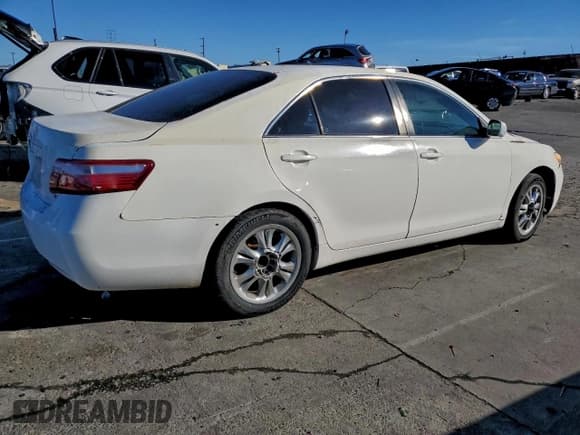 ✅ 2007 Toyota Camry LE • VIN: 4T1BE46K97U693868 • Лот: 93770965. Опубликован ранее на Copart с пробегом 128 264 миль. Бесплатный доступ к архиву аукционных продаж из США и подробный отчёт об истории автомобиля на DreamBid. Изображение 3.
