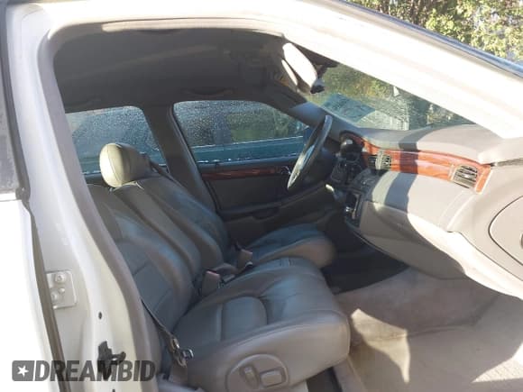 ✅ 2004 Cadillac DeVille • VIN: 1G6KD54Y44U138040 • Lot: 43668856. Wystawiony na IAAI z przebiegiem 169 904 mil. Bezpłatny archiwum sprzedaży aukcyjnych z USA i szczegółowy raport historii pojazdu na DreamBid. Zdjęcie 5.