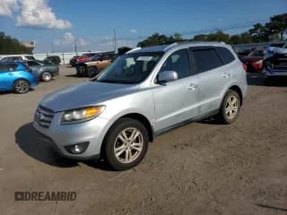 ✅ 2012 Hyundai Santa Fe SE • VIN: 5XYZH4AG7CG102932 • Lot: 71500305. Listed on Copart with 154,758 mi. Free auction sales archive from the USA and detailed vehicle history report at DreamBid. Image 1.