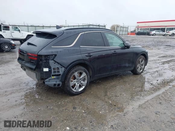 ✅ 2022 Genesis GV70 Sport • VIN: KMUMCDTC0NU018758 • Lot: 41735229. Listed on IAAI with 42,717 mi. Free auction sales archive from the USA and detailed vehicle history report at DreamBid. Image 4.