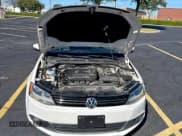 ✅ 2014 Volkswagen Jetta SEL • VIN: 3VWL07AJ8EM389789 • Lot: 90542915. Wystawiony na Copart z przebiegiem 105 070 mil. Bezpłatny archiwum sprzedaży aukcyjnych z USA i szczegółowy raport historii pojazdu na DreamBid. Zdjęcie 7.