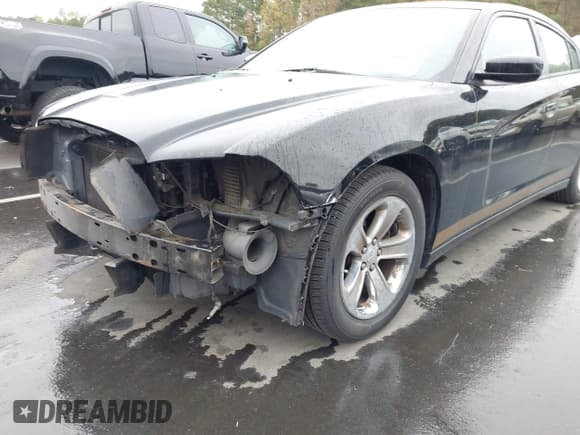 ✅ 2013 Dodge Charger SE • VIN: 2C3CDXBG9DH539839 • Lot: 43548006. Listed on IAAI with 220,448 mi. Free auction sales archive from the USA and detailed vehicle history report at DreamBid. Image 13.