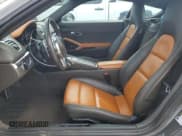 ✅ 2015 Porsche Cayman • VIN: WP0AA2A87FK162965 • Lot: 49075084. Wystawiony na Copart z przebiegiem 38 164 mil. Bezpłatny archiwum sprzedaży aukcyjnych z USA i szczegółowy raport historii pojazdu na DreamBid. Zdjęcie 7.