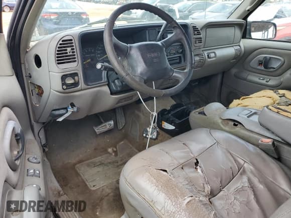 ✅ 1998 GMC Sierra 1500 • VIN: 1GTEK19R1WR500406 • Лот: 59254225. Опубликован ранее на Copart с пробегом 271 184 миль. Бесплатный доступ к архиву аукционных продаж из США и подробный отчёт об истории автомобиля на DreamBid. Изображение 8.