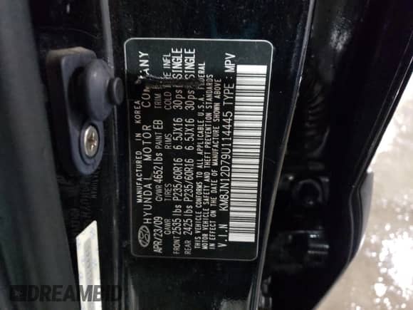 2009 Hyundai Tucson SE with VIN KM8JN12D79U114445, listed as a Copart auction lot 76508704 with 162,112 mi miles and Salvage title. Bid and sale history available at DreamBid. Image 13.