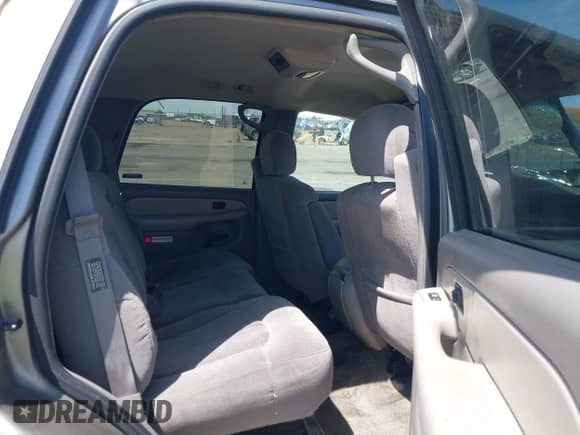 2001 Chevrolet Tahoe LT z VIN 1GNEK13T81R122136, wystawiony jako IAAI lot #42272857 z przebiegiem 216 060 mil mil oraz . Historia ofert i sprzedaży dostępna na DreamBid. Obrazek 8.