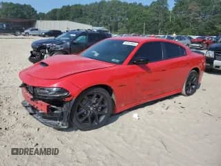 2020 Dodge Charger R/T с VIN 2C3CDXCT2LH145450, выставлен на аукционе Copart как лот 67074065 с пробегом 54 908 миль миль и Списание • Salvage title. История ставок и продаж доступна на DreamBid. Изображение 1.