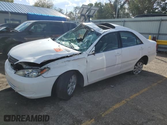✅ 2002 Toyota Camry XLE • VIN: 4T1BE32K42U068769 • Лот: 90386655. Опубликован ранее на Copart с пробегом 175 972 миль. Бесплатный доступ к архиву аукционных продаж из США и подробный отчёт об истории автомобиля на DreamBid. Изображение 1.