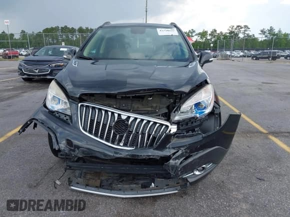 ✅ 2016 Buick Encore Leather • VIN: KL4CJCSB2GB709709 • Lot: 42264692. Listed on IAAI with 124,690 mi. Free auction sales archive from the USA and detailed vehicle history report at DreamBid. Image 12.