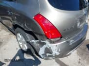 ✅ 2004 Nissan Murano SE • VIN: JN8AZ08W24W335285 • Lot: 43311141. Wystawiony na IAAI z przebiegiem 128 597 mil. Bezpłatny archiwum sprzedaży aukcyjnych z USA i szczegółowy raport historii pojazdu na DreamBid. Zdjęcie 6.