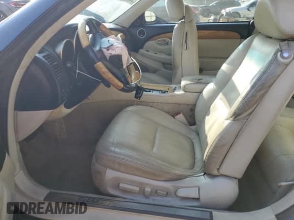 ✅ 2004 Lexus SC 430 • VIN: JTHFN48Y640056865 • Lot: 92985355. Wystawiony na Copart z przebiegiem 237 534 mil. Bezpłatny archiwum sprzedaży aukcyjnych z USA i szczegółowy raport historii pojazdu na DreamBid. Zdjęcie 7.