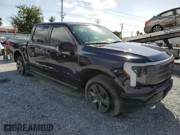 ✅ 2023 Ford F-150 Lightning Lariat • VIN: 1FTVW1EL7PWG20719 • Lot: 85266825. Listed on Copart with 66,237 mi. Free auction sales archive from the USA and detailed vehicle history report at DreamBid. Image 4.