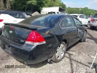 2013 Chevrolet Impala LT z VIN 2G1WB5E32D1164132, wystawiony jako IAAI lot #43044621 z przebiegiem 103 474 mil mil oraz . Historia ofert i sprzedaży dostępna na DreamBid. Obrazek 4.