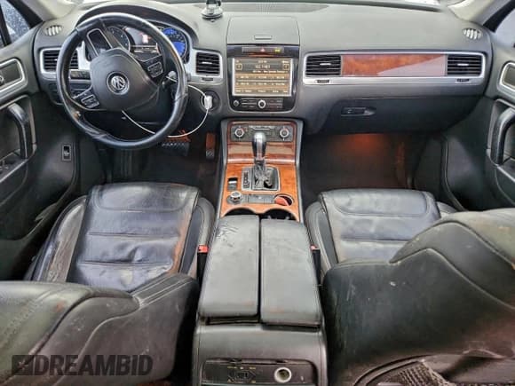 ✅ 2013 Volkswagen Touareg Sport • VIN: WVGEP9BP6DD004242 • Lot: 94153945. Listed on Copart with 185,915 mi. Free auction sales archive from the USA and detailed vehicle history report at DreamBid. Image 8.