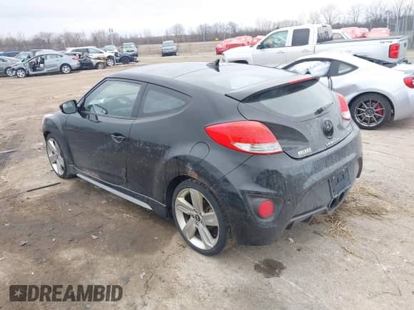 2013 Hyundai Veloster Turbo с VIN KMHTC6AE9DU159675, выставлен на аукционе IAAI как лот 41894186 с пробегом 134 382 миль миль и . История ставок и продаж доступна на DreamBid. Изображение 3.
